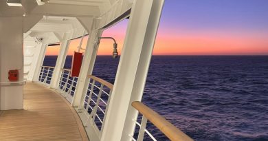 The deck of a cruise ship at sunset