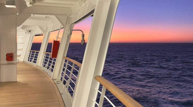 The deck of a cruise ship at sunset
